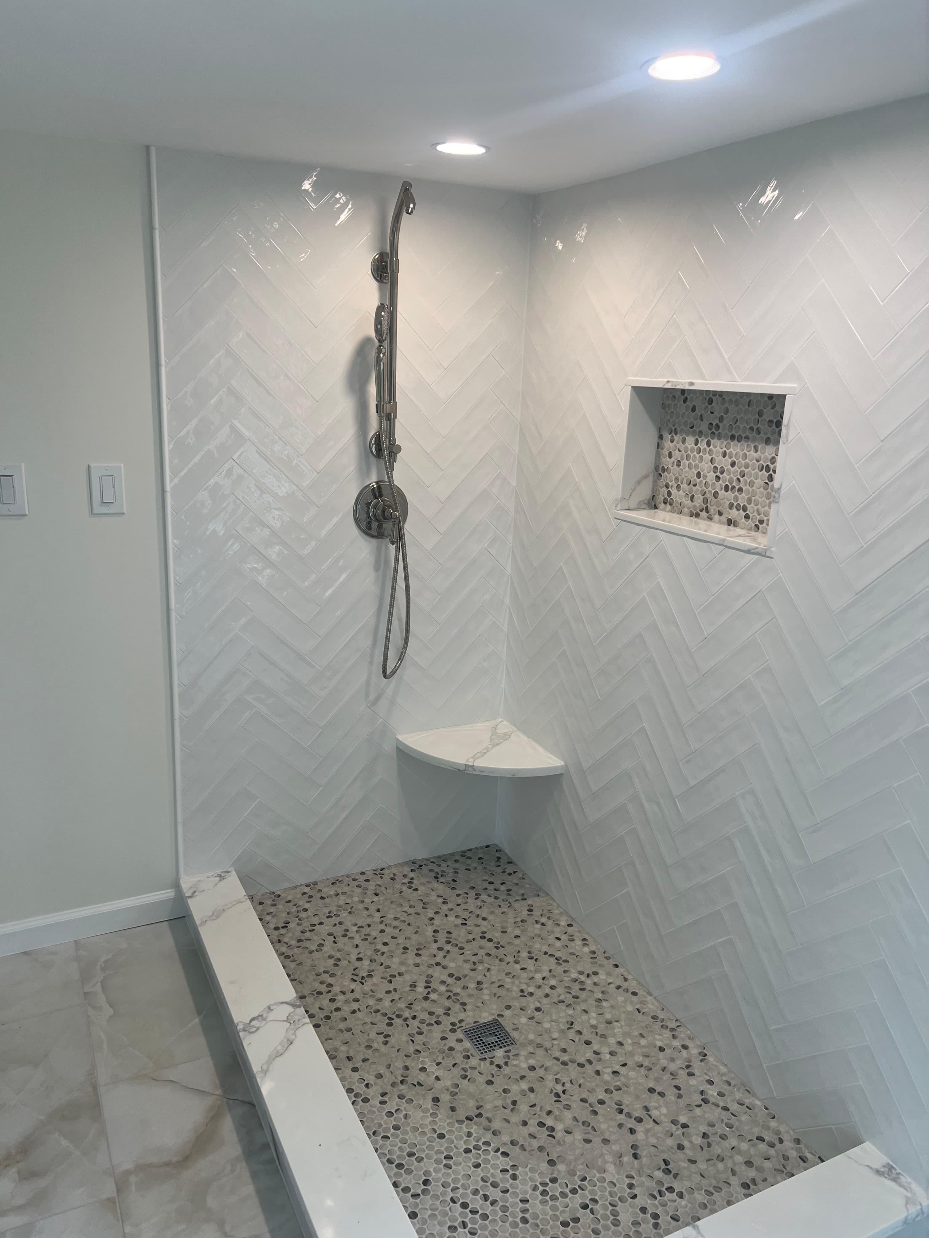 Bathroom with herringbone tile